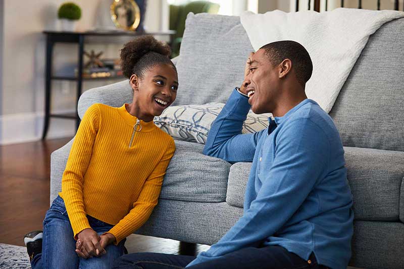 dad and daughter talking